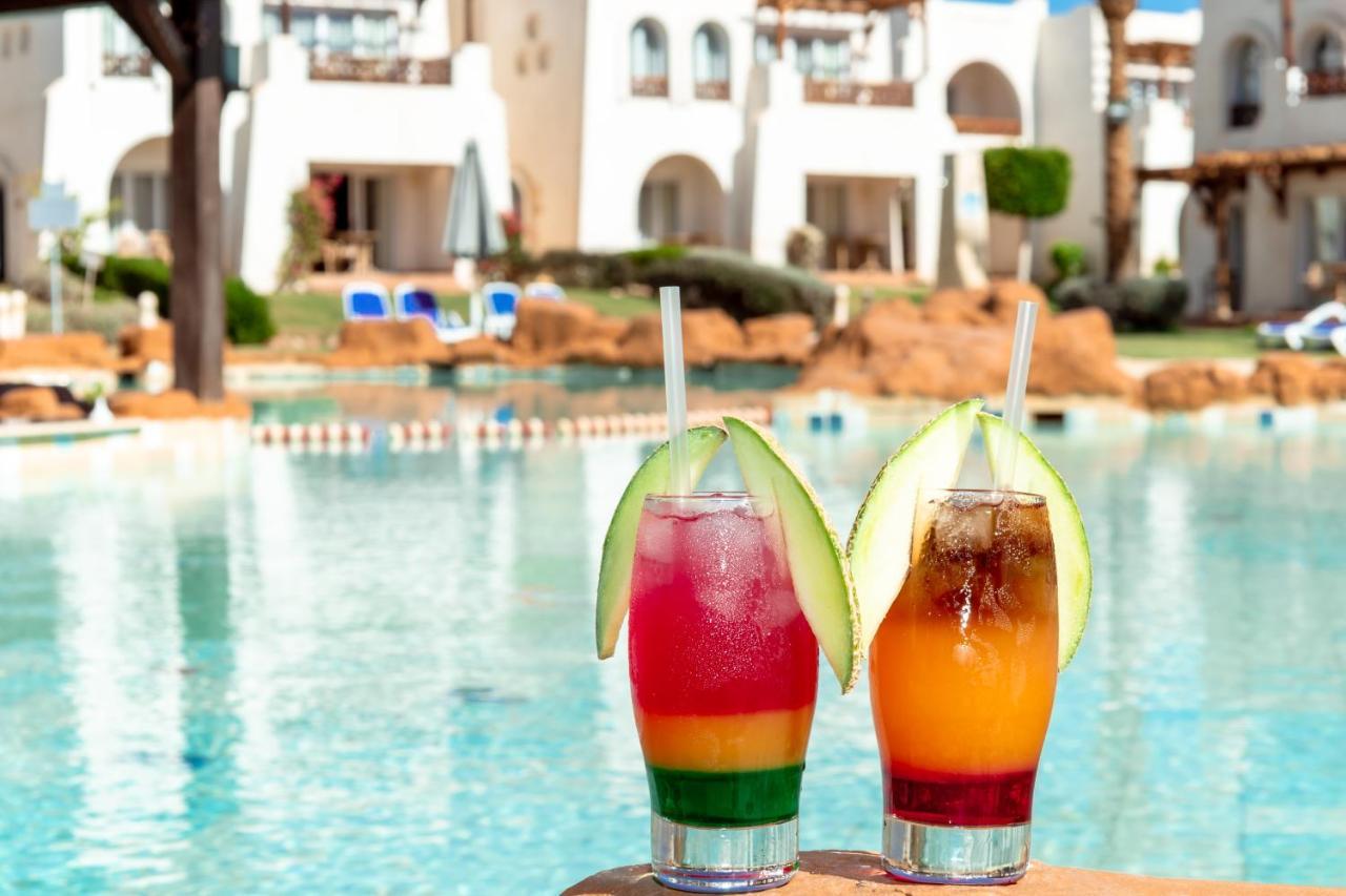 Отель Sharm Dreams Vacation Club - Aqua Park Экстерьер фото Cocktails at the pool