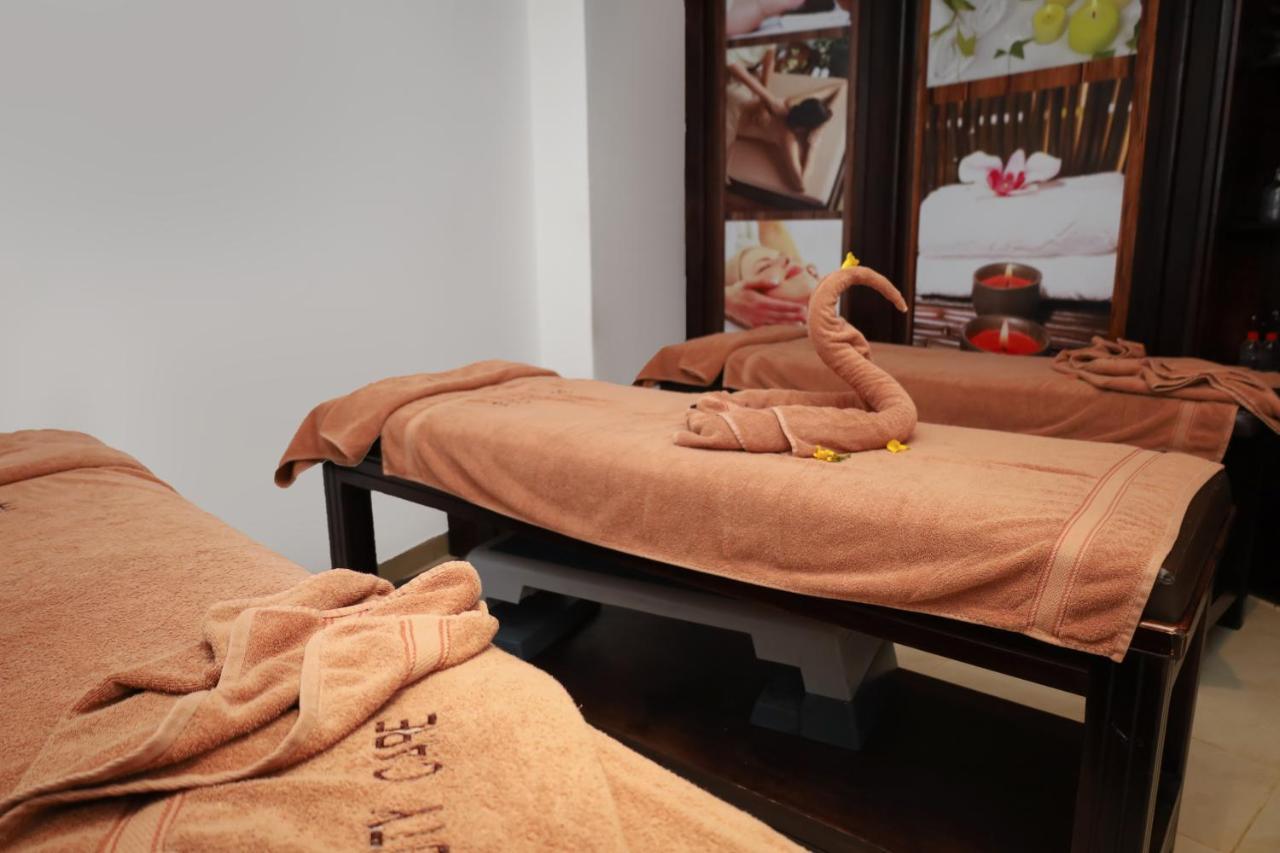 Отель Sharm Dreams Vacation Club - Aqua Park Экстерьер фото Thai massage beds
