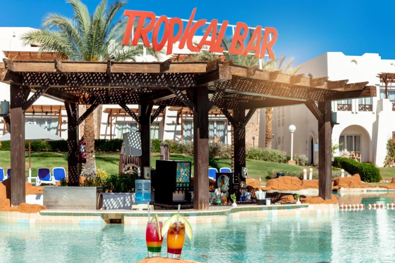 Отель Sharm Dreams Vacation Club - Aqua Park Экстерьер фото Tropical Bar