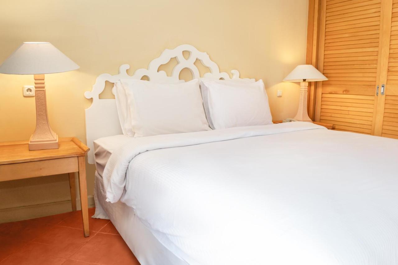 Отель Sharm Dreams Vacation Club - Aqua Park Экстерьер фото A bed