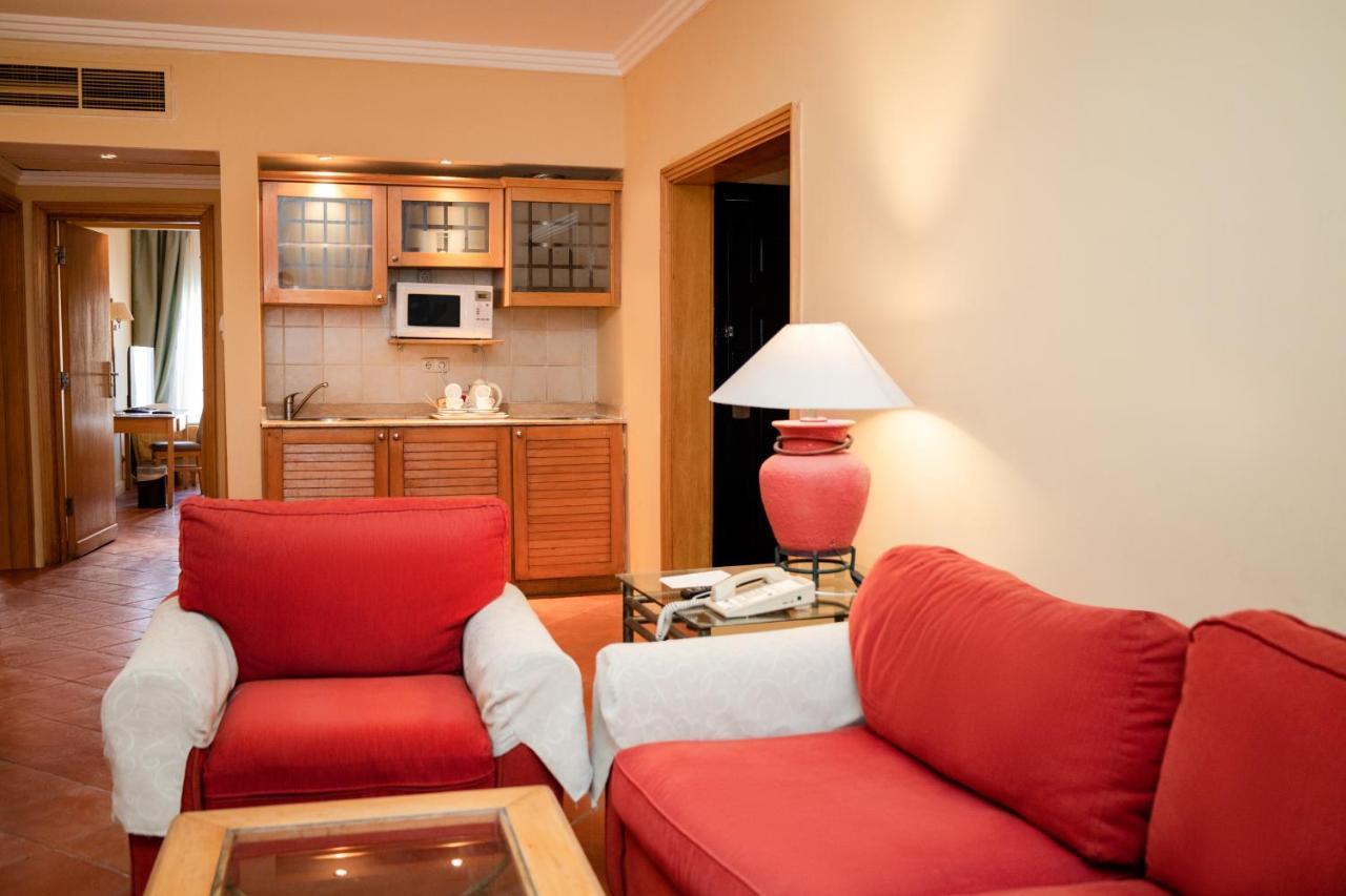Отель Sharm Dreams Vacation Club - Aqua Park Экстерьер фото A living room with a kitchenette