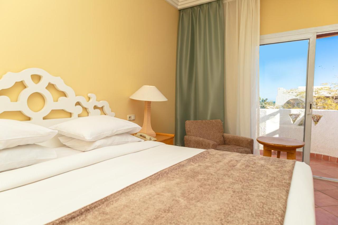 Отель Sharm Dreams Vacation Club - Aqua Park Экстерьер фото A bedroom at the hotel